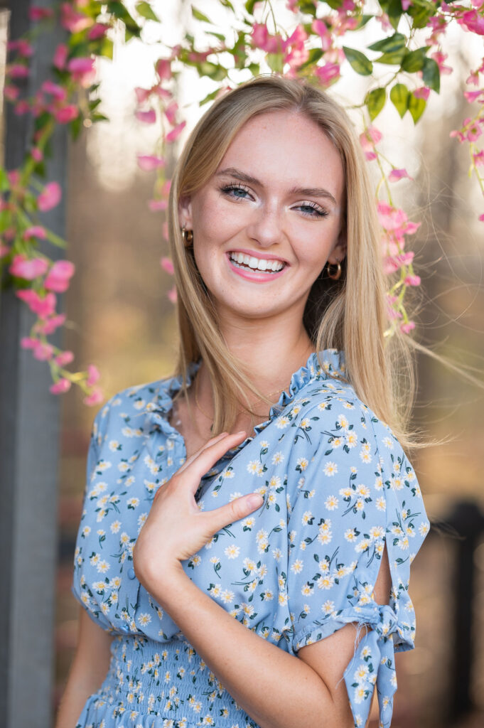 hillgrove high school senior girl looking at the camera and smiling during her senior photo session